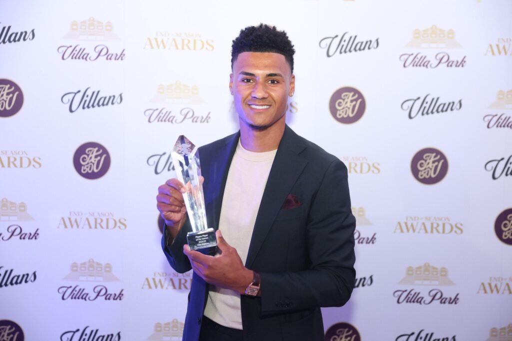 Ollie Watkins holding his award at the Aston Villa end of season awards ceremony.